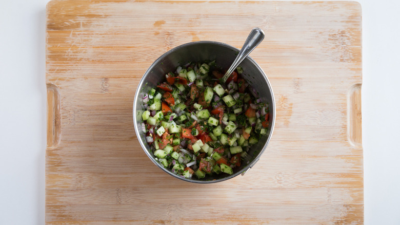 cucumber tomato salad in bowl