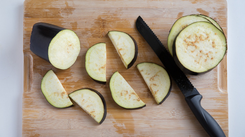 sliced eggplant on cutting board 