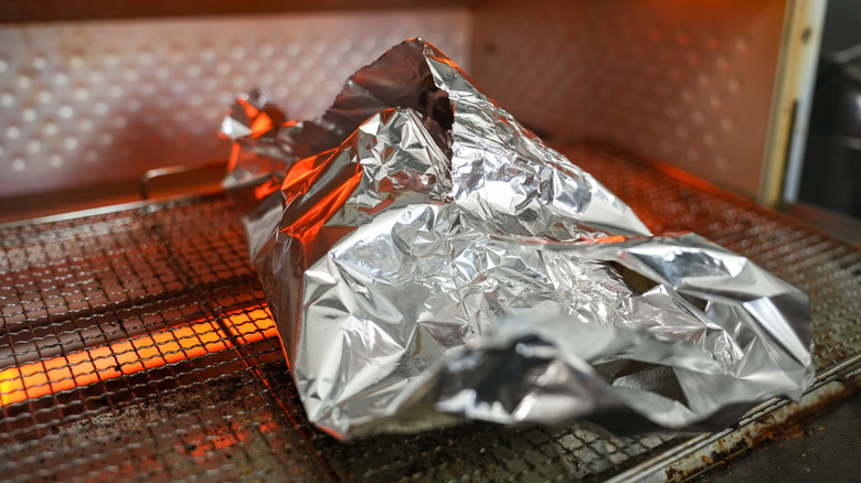 Reheating food wrapped in aluminum foil in a toaster oven