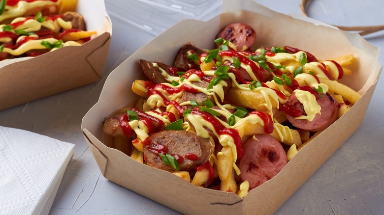 Salchipapas in to-go box