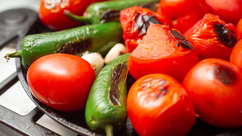 Blistered veggies on a cast-iron skillet