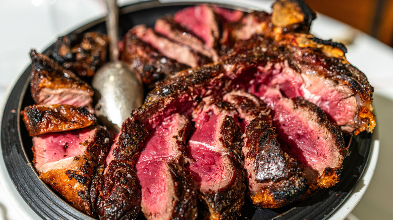 T-bone steak cut into individual portions