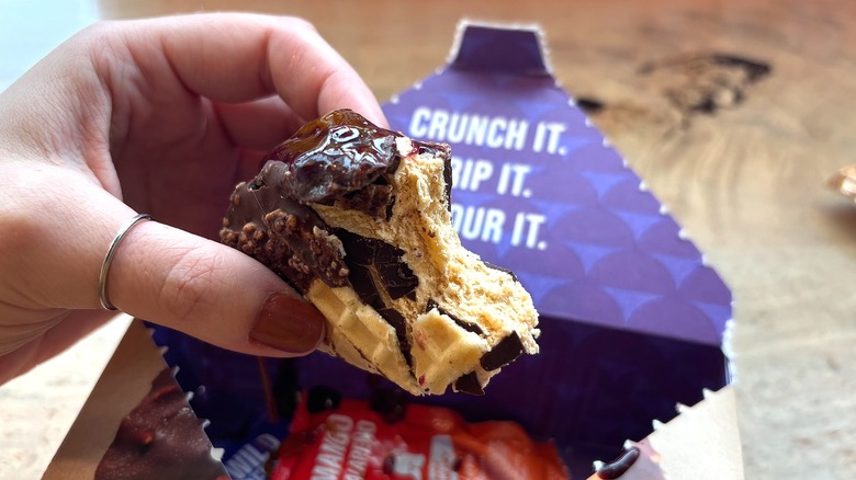 Salt & Straw Tacolate with bite taken out of it, showing ice cream interior