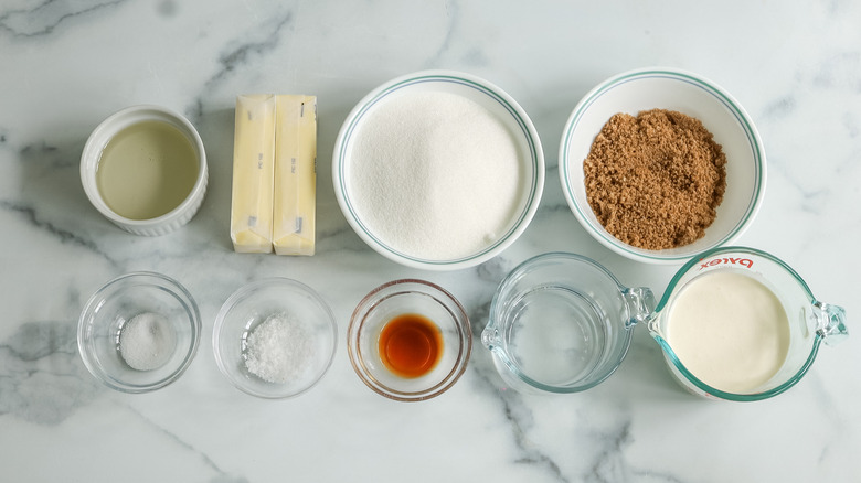 Ingredients for salted caramel candies on countertop