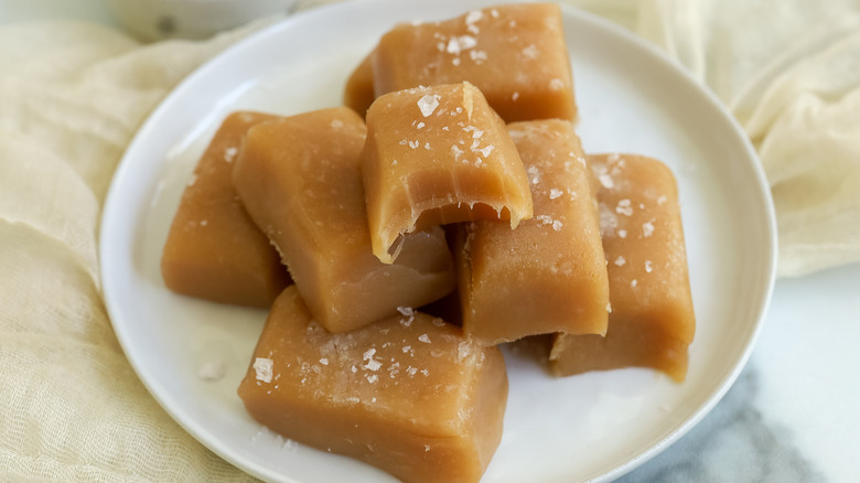 salted caramel candies on a white plate