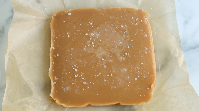 caramel candy block on paper