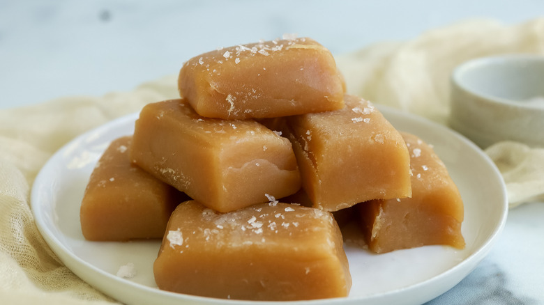 caramel candies on a white plate