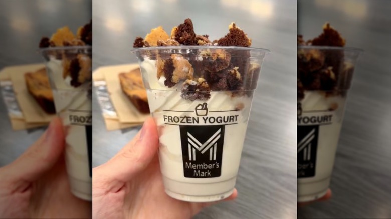 Cup of soft serve from Sam's Club topped with a Member's Mark Cookie Dough Brownie