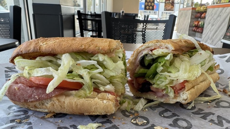 Quiznos' sub cut in half on Quiznos paper