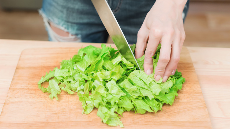 lettuce being chopped