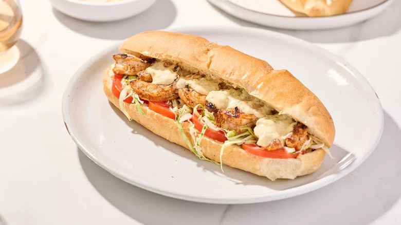 Grilled Shrimp Po-Boy Sandwich on white plate
