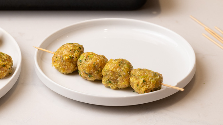 meatballs threaded onto skewers