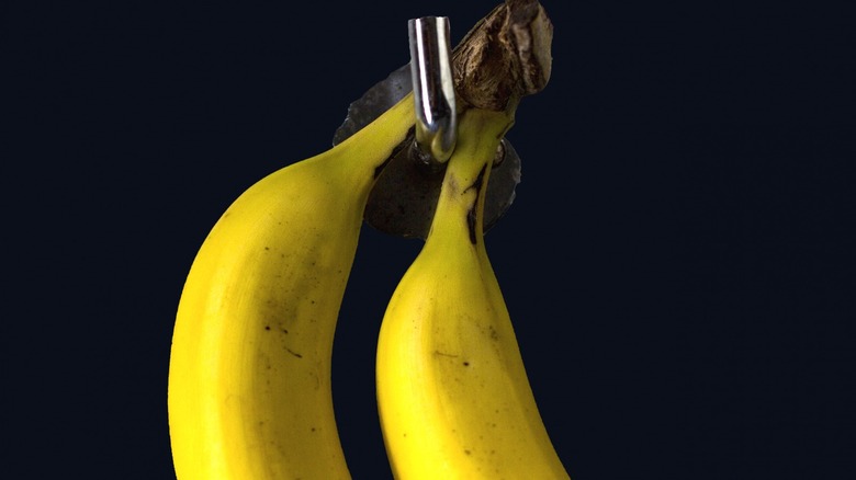 Bananas hanging from a hook