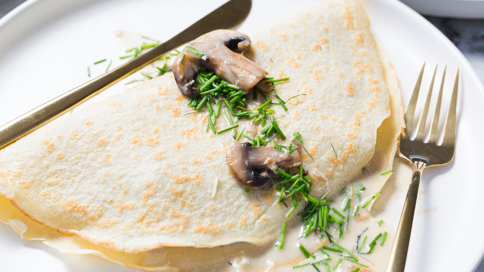 Savory Chicken And Mushroom Crepe Recipe - Tasting Table