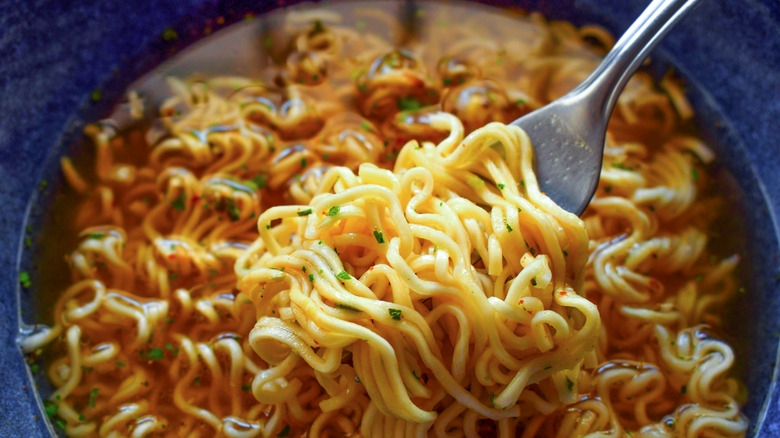 Ramen noodles in a bowl with a fork