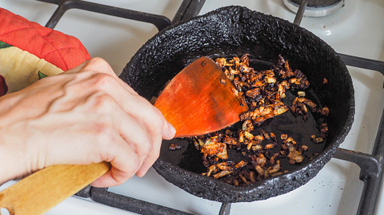 Burnt onions in a pan