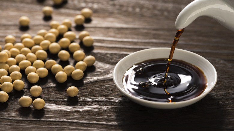 Dish of dark soy sauce