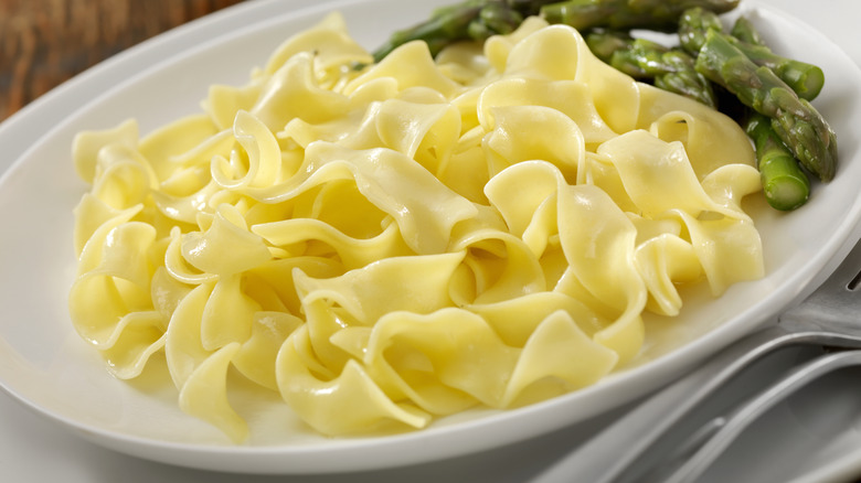 Top-view of a platter of homemade buttered noodles