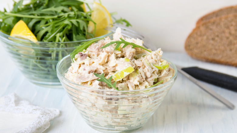 bowl of chicken salad and arugula