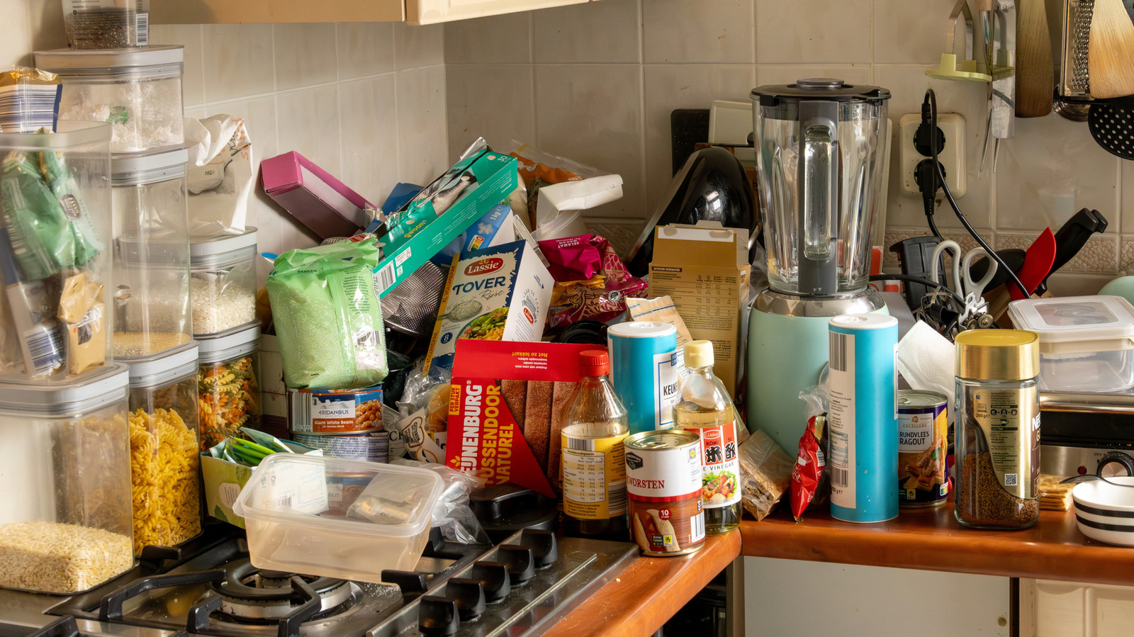 Say Goodbye To Cluttered Countertops With A Charming Old Cookie Tin Solution