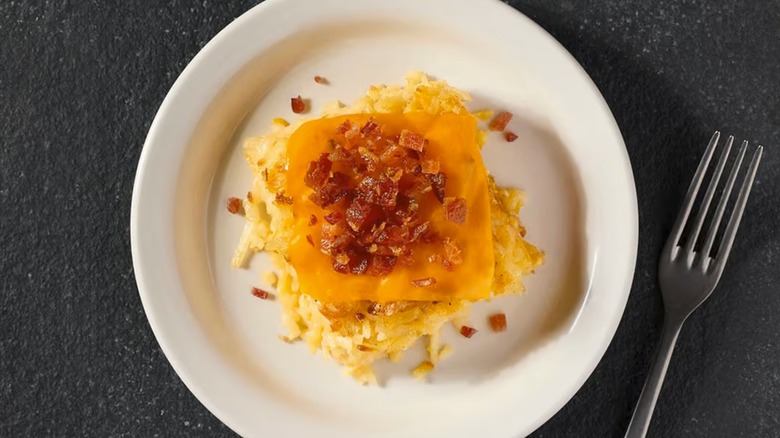 Cracker Barrel Loaded Hashbrown Casserole on a white serving plate