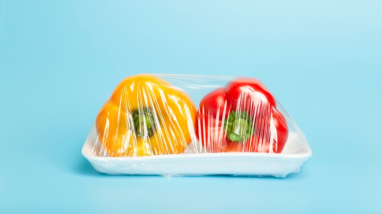 Bell peppers wrapped in cellophane