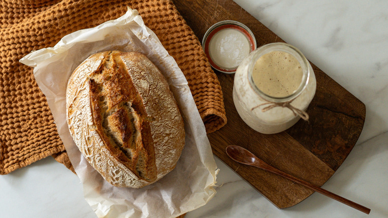 sourdough loaf with yeast in jar