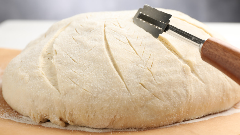 scoring bread with a lame