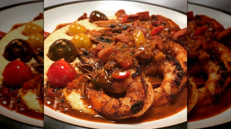 Shrimp and grits with multi-colored tomatoes