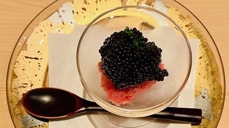 Sushi and black caviar in a glass dish at Restaurant Masa