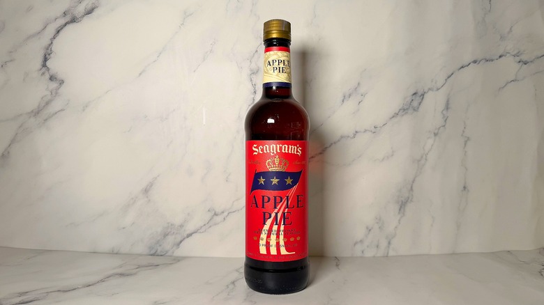 Bottle of Seagram's Apple Pie Whiskey on marble surface