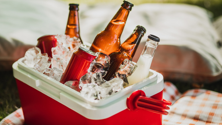 Beverages and ice in red cooler