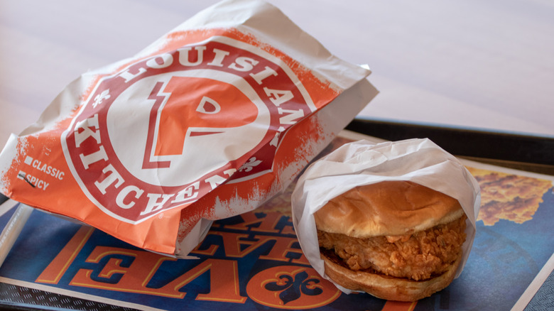 Popeyes chicken sandwich on tray