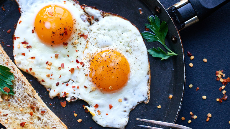 Fried eggs on a pan