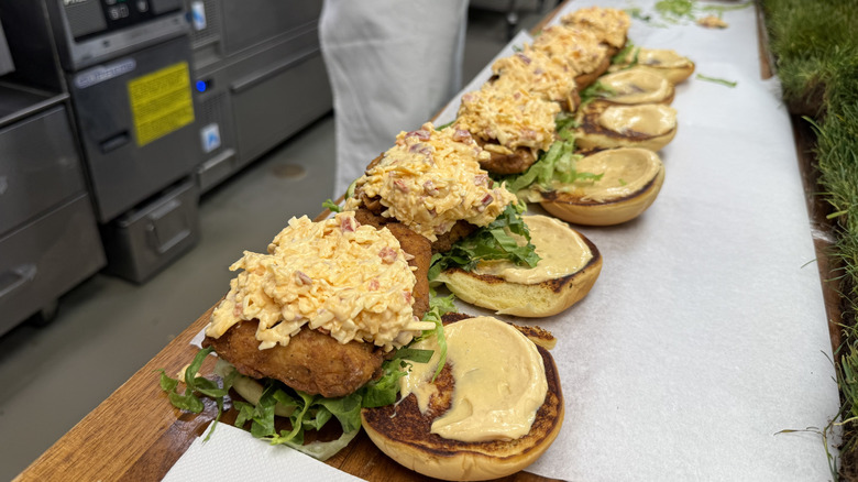 a row of Clubhouse Pimento Cheese Chicken Sandwiches