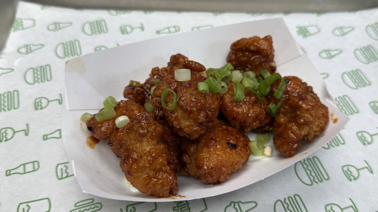 A boat filled with K-Shack Fried Chicken Bites