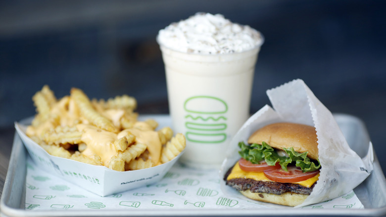 Tray of Shake Shack fries, a milkshake, and a burger