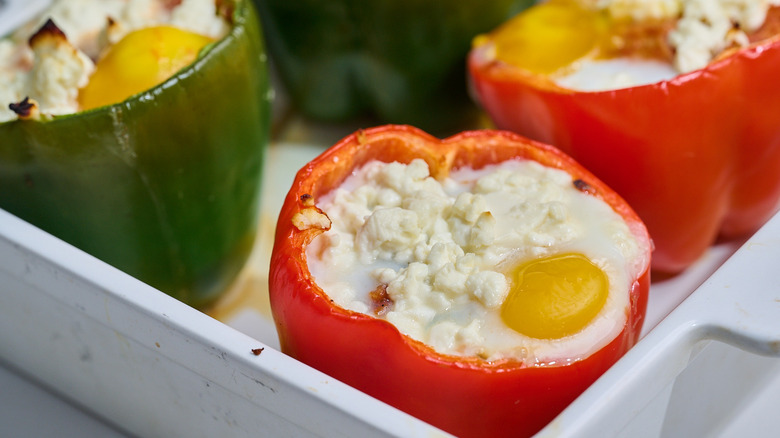 shakshuka stuffed peppers in a baking dish