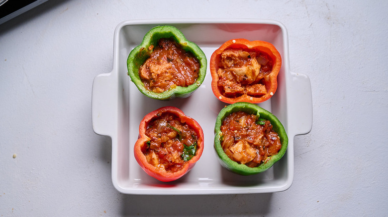 Bell peppers filled with tomato sauce