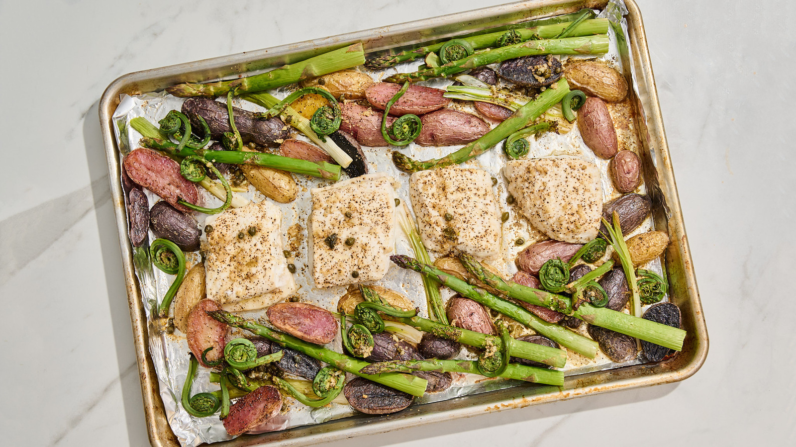 Sheet Pan Garlic Butter Halibut With Spring Vegetables Recipe