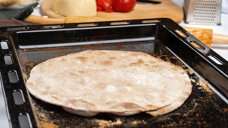 tortillas set on sheet pan