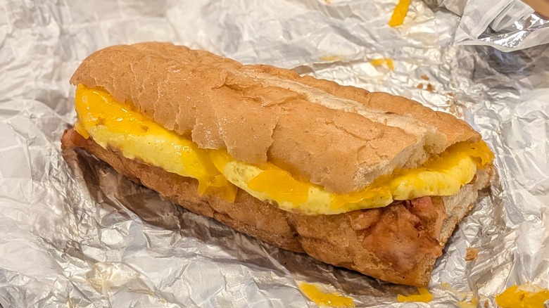 Sheetz's breakfast hoagie with eggs, cheddar, and bacon on foil paper