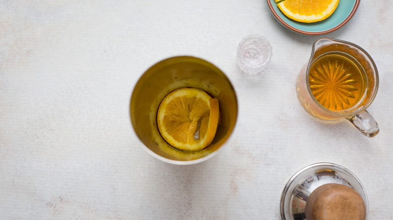 orange wheel in cocktail shaker