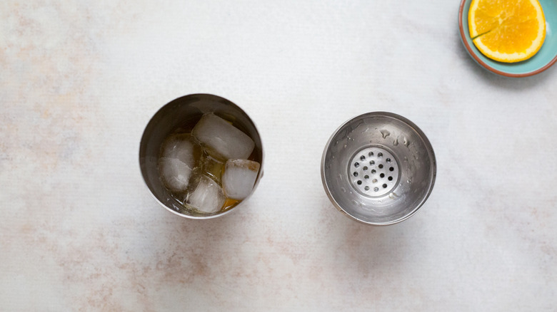 icy cocktail inside cocktail shaker