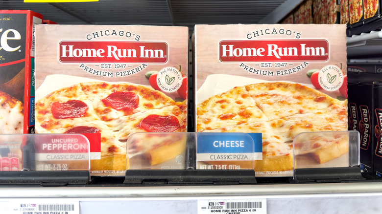 Home Run Inn pizza boxes in frozen section at grocery store
