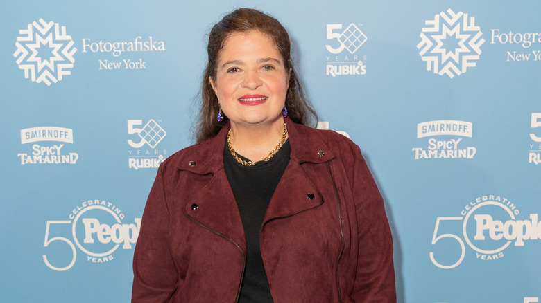 Alex Guarnaschelli smiling on a red carpet