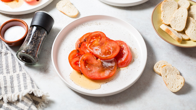 Brown butter tomatoes served on table
