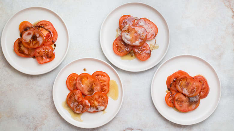 buttery tomatoes served on table