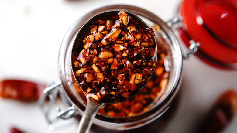 Close-up of chili oil crisp in a glass jar