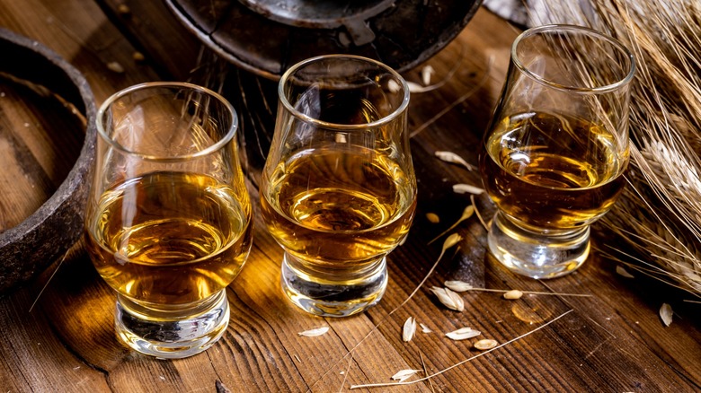 Three glasses of scotch with barley